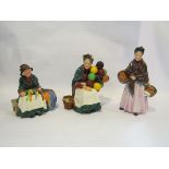 Three Royal Doulton figurines; The Orange Lady H.N. 1759, The Old Balloon Seller H.N.