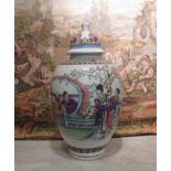 An Oriental ginger jar depicting ladies in costume, trees and blossom design,