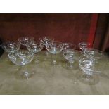 A set of six saucer champagne glasses with foliate engraved design,