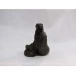 A bronzed Otter figural group,