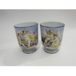 A pair of Victorian vases hand-painted with cherubs,