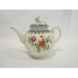 An early Royal Worcester teapot hand painted with floral bouquet and with a floral finial (chip to