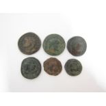 A collection of Roman style coins in bronze including Follis examples