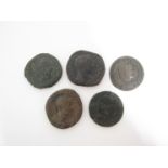 A collection of Roman style bronze coins,