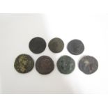 A collection of Roman style coins in bronze including Follis examples