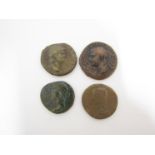 A Roman bronze coin of Drusus Julius Caesar (14BC-23AD) and of Nero (54-68AD) and of Claudius