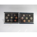 Cased Royal Mint uncirculated proof sets for the years 1984, 1985,