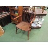 A 19th Century elm and ash stick back hooped armchair on turned legs joined by an 'H' stretcher