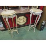 A pair of ornate painted marble topped plant/lamp stands,