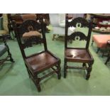 A pair of 18th Century carved oak Derbyshire chairs on turned and square legs joined by stretchers