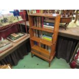 A pine waterfall bookcase with drawer and carry handles 106cm height X 53cm Width X 30cm Diameter