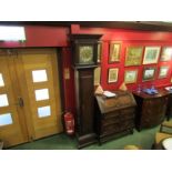 An oak cased grandfather clock, brass dial,