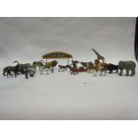 A collection of lead zoo animals to include pelicans, an ostrich, llama, giraffe, bison, kangaroo,