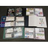 Seven stamp albums containing first day covers, loose examples etc.