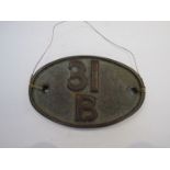 A reproduction cast iron steam locomotive shed code plate 31B - March