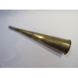 A brass plate layers horn with metal mouth piece