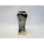 A Moorcroft Snowbells pattern vase designed by Sian Leeper, 16cm tall,