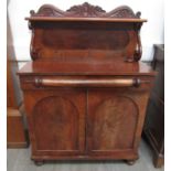 An early Victorian chiffonier scrolled half gallery back over single frieze drawer,