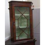 A 19th Century walnut wall hanging astragal glazed display cabinet with green painted interior,