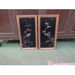 Two inlaid Japanese panels with mother-of-pearl decoration depicting birds perched on branches,