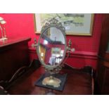 A classical style brass pedestal swing mirror