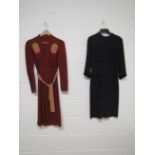 A 1940's navy creped day dress with tiered design to the front and a rust crepe 1930's dress with