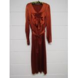 A 1930's tomato red silk satin dress with large ruched bow to front,