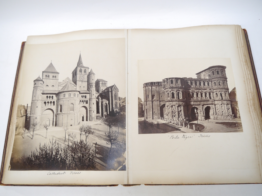 A Victorian photograph album containing over 130 mainly albumen print mounted photographs, c. - Image 5 of 18