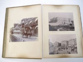 A large Victorian photograph album containing approx.