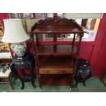 A William IV mahogany set of four tier shelves,