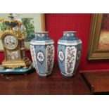 A pair of Losol Ware vases with floral panels,