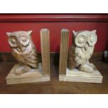 A pair of carved owl bookends,