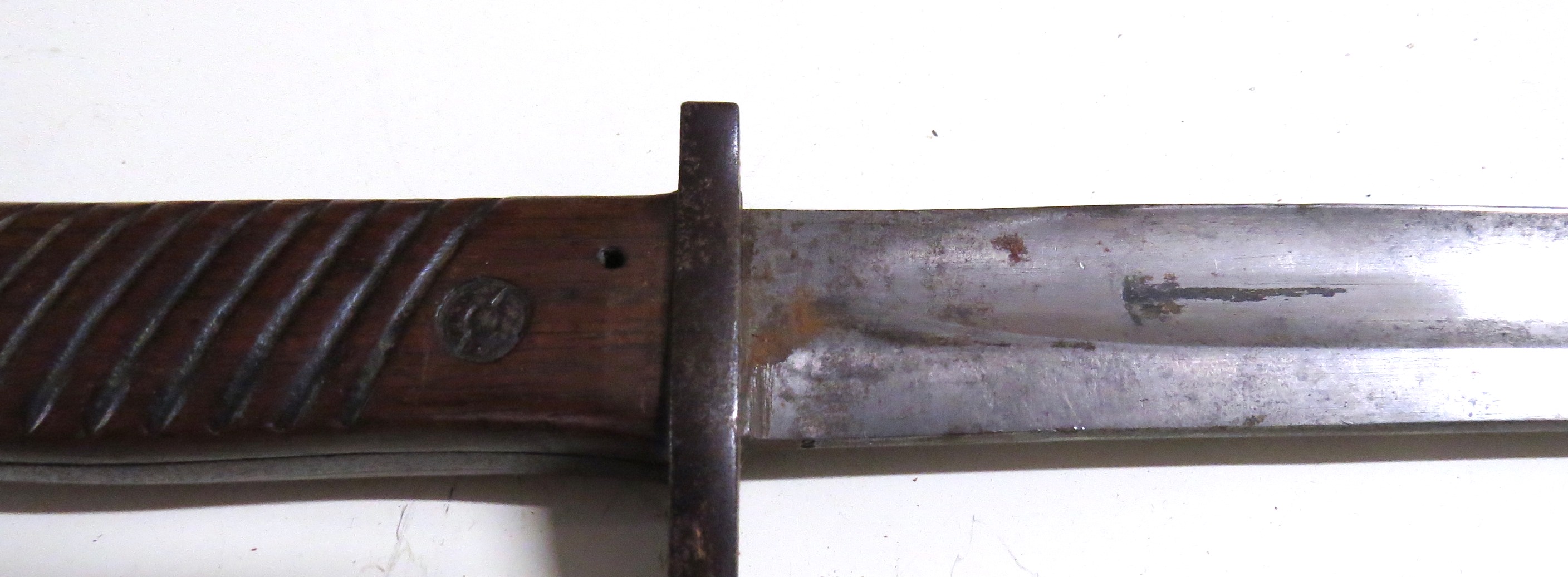 A French Model 42T sabre bayonet, a later French example modified and corroded, - Image 2 of 3