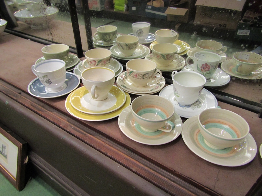 Four Susie Cooper trios and four Susie Cooper tea cups and saucers (8)