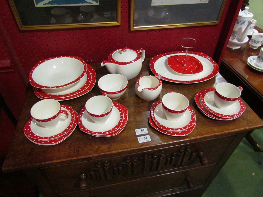 A quantity of Stylecraft by Midwinter polka dot ceramics with red border including cups, saucers,