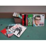 A collection of 1950's and 1960's picture sleeve 7" EP's including Buddy Holly, Marty Wilde,