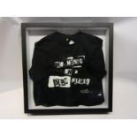 A framed and glazed Jamie Reid designed 'No Music On A Dead Planet' T-shirt