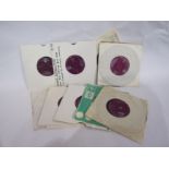 A collection of 7" singles by Lonnie Donegan (11,