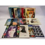 Assorted LP's including The Beatles, Kate Bush, David Bowie, Cat Stevens, ELO, Status Quo,