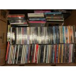 A box of approximately 110 assorted CD's