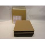 Approximately 50 unused cardboard record mailers with a quantity of stiffener boards and a sheet of