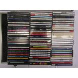 Four cases containing a collection of assorted CD's