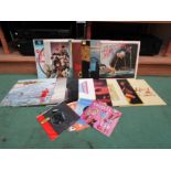 A collection of LP's including Genesis, Roxy Music, Cliff Richard,