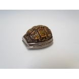 A Georgian terrapin shell snuff box with white metal mount, armorial crested,