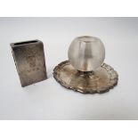 A silver presentation match striker, imperfection to glass and a silver match box holder a/f,