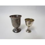A silver cup and egg cup Roberts & Belk, Sheffield 1915 and Atkin Brothers, Sheffield 1924, (2),
