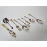Quantity of silver flatware including spoons, fork, butter knives and sugar sifter,