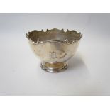 A Barker Brothers silver pedestal bowl with shaped edge, Chester, date mark rubbed, monogrammed, 13.
