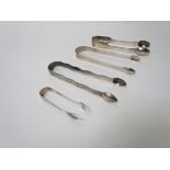 Four sets of sugar tongs including Georgian, Victorian and 20th Century dates,