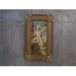 A 19th Century French oil on canvas boudour interior with semi nude female looking into a hand